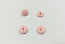 Кнопка пластиковая 10.5мм цв.св.розовый(в упак.1000шт)